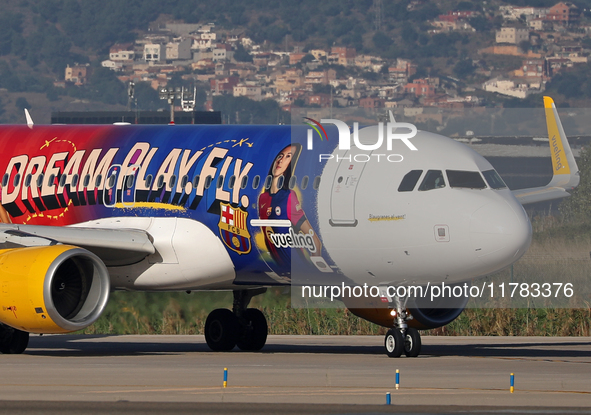 The FC Barcelona women's team launches the Vueling Airbus 320-214 to travel to Madrid with the new livery, featuring images of Aitana Bonmat...