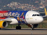 The FC Barcelona women's team launches the Vueling Airbus 320-214 to travel to Madrid with the new livery, featuring images of Aitana Bonmat...