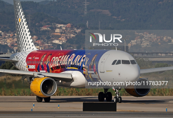 The FC Barcelona women's team launches the Vueling Airbus 320-214 to travel to Madrid with the new livery, featuring images of Aitana Bonmat...