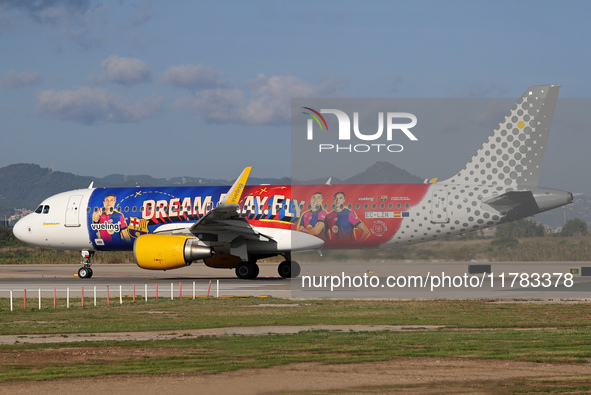 The FC Barcelona women's team launches the Vueling Airbus 320-214 to travel to Madrid with the new livery, featuring images of Aitana Bonmat...