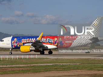 The FC Barcelona women's team launches the Vueling Airbus 320-214 to travel to Madrid with the new livery, featuring images of Aitana Bonmat...