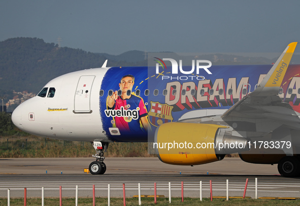 The FC Barcelona women's team launches the Vueling Airbus 320-214 to travel to Madrid with the new livery, featuring images of Aitana Bonmat...