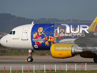 The FC Barcelona women's team launches the Vueling Airbus 320-214 to travel to Madrid with the new livery, featuring images of Aitana Bonmat...