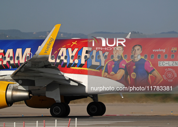 The FC Barcelona women's team launches the Vueling Airbus 320-214 to travel to Madrid with the new livery, featuring images of Aitana Bonmat...