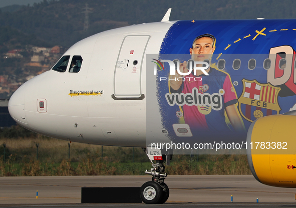 The FC Barcelona women's team launches the Vueling Airbus 320-214 to travel to Madrid with the new livery, featuring images of Aitana Bonmat...