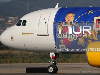 The FC Barcelona women's team launches the Vueling Airbus 320-214 to travel to Madrid with the new livery, featuring images of Aitana Bonmat...