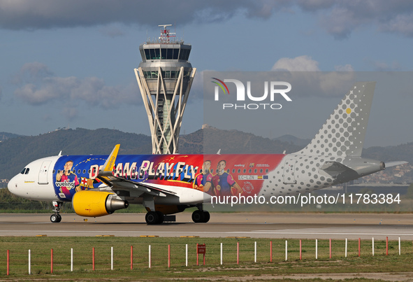 The FC Barcelona women's team launches the Vueling Airbus 320-214 to travel to Madrid with the new livery, featuring images of Aitana Bonmat...