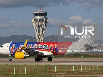 The FC Barcelona women's team launches the Vueling Airbus 320-214 to travel to Madrid with the new livery, featuring images of Aitana Bonmat...