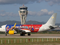 The FC Barcelona women's team launches the Vueling Airbus 320-214 to travel to Madrid with the new livery, featuring images of Aitana Bonmat...