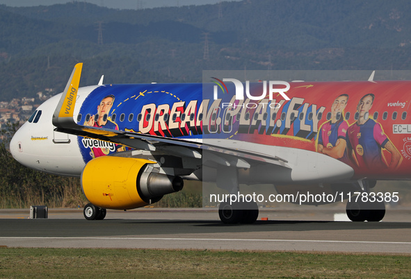 The FC Barcelona women's team launches the Vueling Airbus 320-214 to travel to Madrid with the new livery, featuring images of Aitana Bonmat...