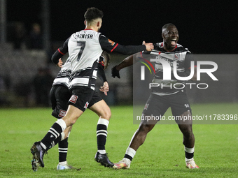 Cedric Main of Darlington scores to make it 1-0 and sends the home team through to the next round during the Isuzu FA Trophy Second round ma...