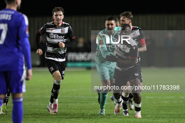 Cedric Main of Darlington scores to make it 1-0 and sends the home team through to the next round during the Isuzu FA Trophy Second round ma...