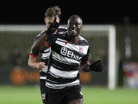 Cedric Main of Darlington scores to make it 1-0 and sends the home team through to the next round during the Isuzu FA Trophy Second round ma...