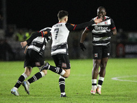 Cedric Main of Darlington scores to make it 1-0 and sends the home team through to the next round during the Isuzu FA Trophy Second round ma...