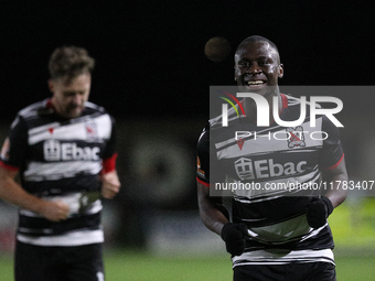 Cedric Main of Darlington scores to make it 1-0 and sends the home team through to the next round during the Isuzu FA Trophy Second round ma...