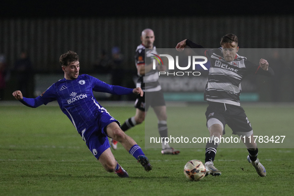 Cian Coleman of Buxton tackles Jarrett Rivers of Darlington during the Isuzu FA Trophy Second round match between Darlington and Buxton at B...