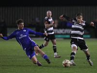 Cian Coleman of Buxton tackles Jarrett Rivers of Darlington during the Isuzu FA Trophy Second round match between Darlington and Buxton at B...