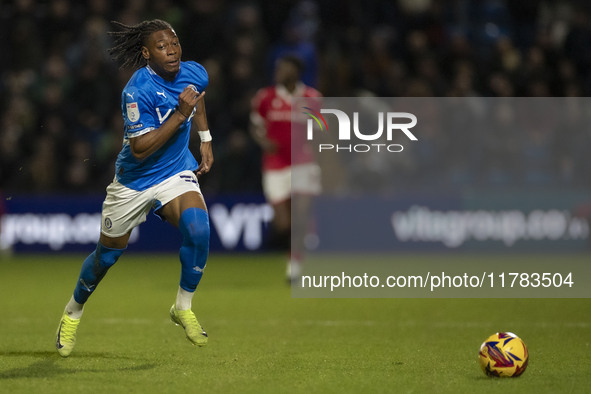 Tayo Adaramola #33 of Stockport County F.C. is in action during the Sky Bet League 1 match between Stockport County and Wrexham at the Edgel...