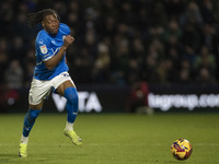 Tayo Adaramola #33 of Stockport County F.C. is in action during the Sky Bet League 1 match between Stockport County and Wrexham at the Edgel...