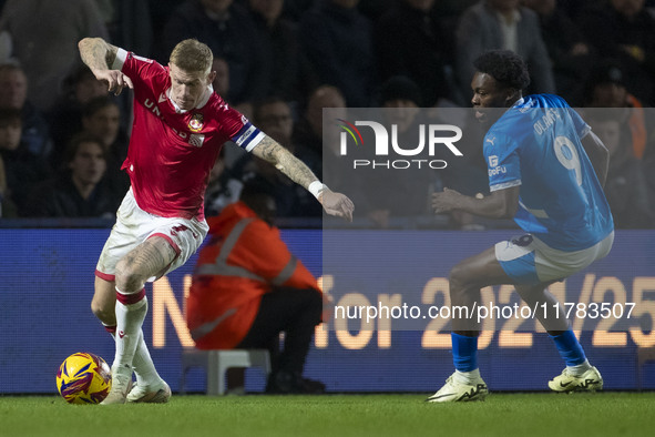 James McClean #7 of Wrexham A.F.C. participates in the Sky Bet League 1 match between Stockport County and Wrexham at the Edgeley Park Stadi...