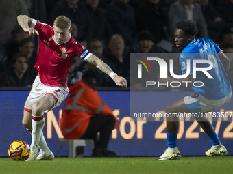 James McClean #7 of Wrexham A.F.C. participates in the Sky Bet League 1 match between Stockport County and Wrexham at the Edgeley Park Stadi...