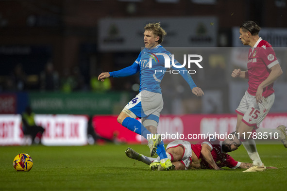 Will Collar #14 of Stockport County F.C. is fouled by the opponent during the Sky Bet League 1 match between Stockport County and Wrexham at...