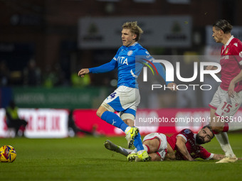 Will Collar #14 of Stockport County F.C. is fouled by the opponent during the Sky Bet League 1 match between Stockport County and Wrexham at...