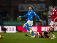 Will Collar #14 of Stockport County F.C. is fouled by the opponent during the Sky Bet League 1 match between Stockport County and Wrexham at...