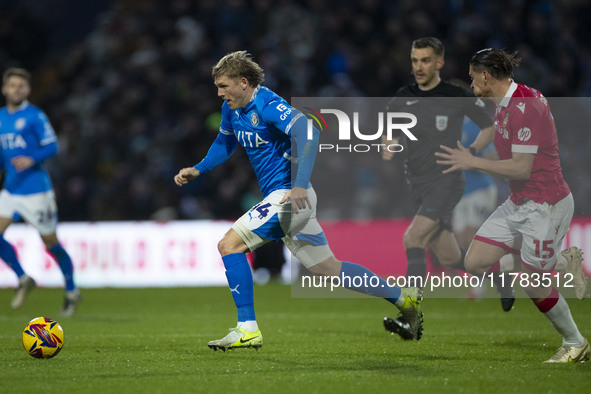 Will Collar, number 14 of Stockport County F.C., is in possession of the ball during the Sky Bet League 1 match between Stockport County and...