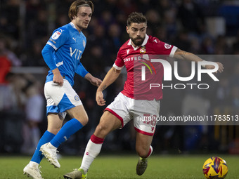 Elliot Lee #38 of Wrexham A.F.C. is in action during the Sky Bet League 1 match between Stockport County and Wrexham at the Edgeley Park Sta...