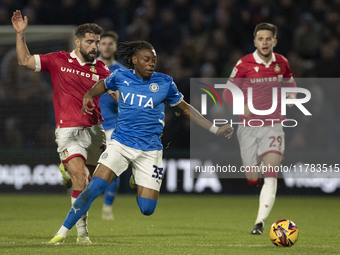 Tayo Adaramola #33 of Stockport County F.C. is in action during the Sky Bet League 1 match between Stockport County and Wrexham at the Edgel...