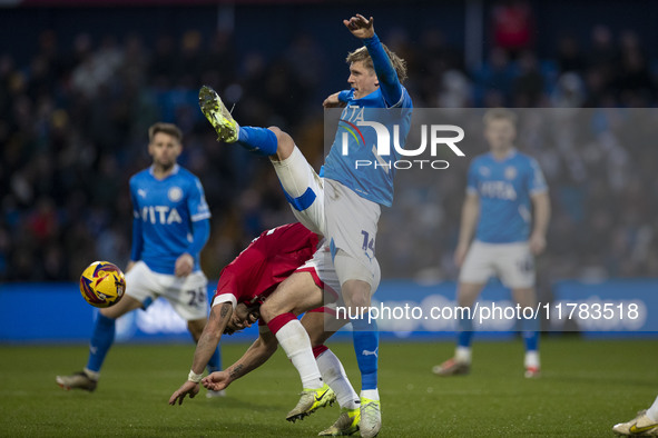 Will Collar, number 14 of Stockport County F.C., challenges the opponent during the Sky Bet League 1 match between Stockport County and Wrex...