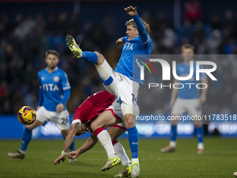 Will Collar, number 14 of Stockport County F.C., challenges the opponent during the Sky Bet League 1 match between Stockport County and Wrex...