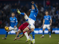 Will Collar, number 14 of Stockport County F.C., challenges the opponent during the Sky Bet League 1 match between Stockport County and Wrex...