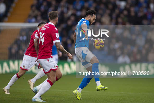 Tanto Olaofe #9 of Stockport County F.C. controls the ball during the Sky Bet League 1 match between Stockport County and Wrexham at the Edg...