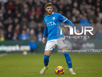 Ethan Pye, number 15 of Stockport County F.C., participates in the Sky Bet League 1 match between Stockport County and Wrexham at the Edgele...