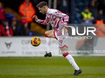 Ryan Barnett #29 of Wrexham A.F.C. warms up during the Sky Bet League 1 match between Stockport County and Wrexham at the Edgeley Park Stadi...