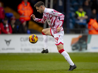 Ryan Barnett #29 of Wrexham A.F.C. warms up during the Sky Bet League 1 match between Stockport County and Wrexham at the Edgeley Park Stadi...