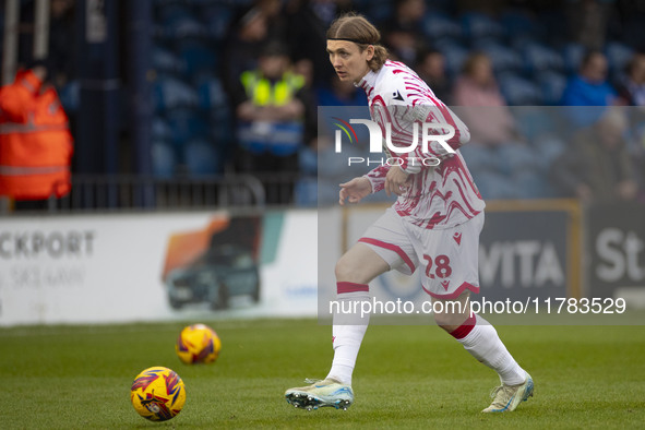 Jon Daoi Boovarsson #28 of Wrexham A.F.C. warms up during the Sky Bet League 1 match between Stockport County and Wrexham at the Edgeley Par...