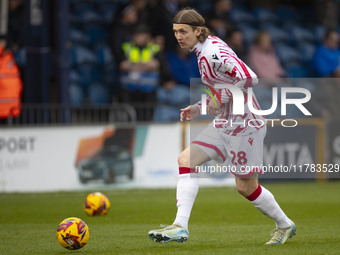 Jon Daoi Boovarsson #28 of Wrexham A.F.C. warms up during the Sky Bet League 1 match between Stockport County and Wrexham at the Edgeley Par...