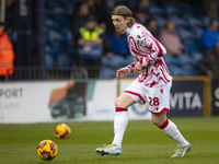 Jon Daoi Boovarsson #28 of Wrexham A.F.C. warms up during the Sky Bet League 1 match between Stockport County and Wrexham at the Edgeley Par...