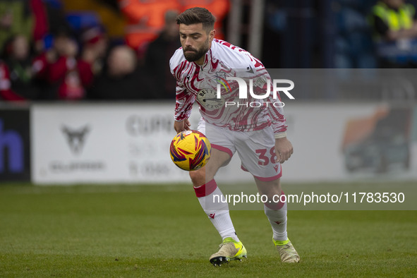 Elliot Lee #38 of Wrexham A.F.C. warms up during the Sky Bet League 1 match between Stockport County and Wrexham at the Edgeley Park Stadium...