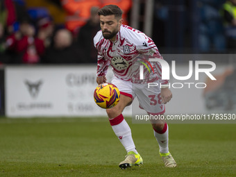 Elliot Lee #38 of Wrexham A.F.C. warms up during the Sky Bet League 1 match between Stockport County and Wrexham at the Edgeley Park Stadium...