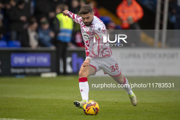 Elliot Lee #38 of Wrexham A.F.C. warms up during the Sky Bet League 1 match between Stockport County and Wrexham at the Edgeley Park Stadium...