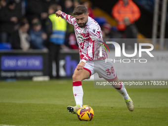 Elliot Lee #38 of Wrexham A.F.C. warms up during the Sky Bet League 1 match between Stockport County and Wrexham at the Edgeley Park Stadium...