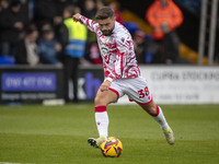 Elliot Lee #38 of Wrexham A.F.C. warms up during the Sky Bet League 1 match between Stockport County and Wrexham at the Edgeley Park Stadium...