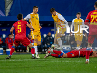 Players are in action during the UEFA Nations League 2024 - League phase - Matchday 4 match between Andorra and Moldova at Estadi Nacional d...