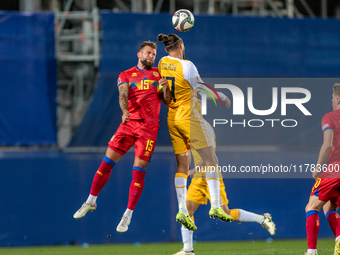 Moises San Nicolas of Andorra and Victor Mudrac of Moldova compete for the ball during the UEFA Nations League 2024 - League phase - Matchda...