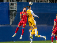 Moises San Nicolas of Andorra and Victor Mudrac of Moldova compete for the ball during the UEFA Nations League 2024 - League phase - Matchda...