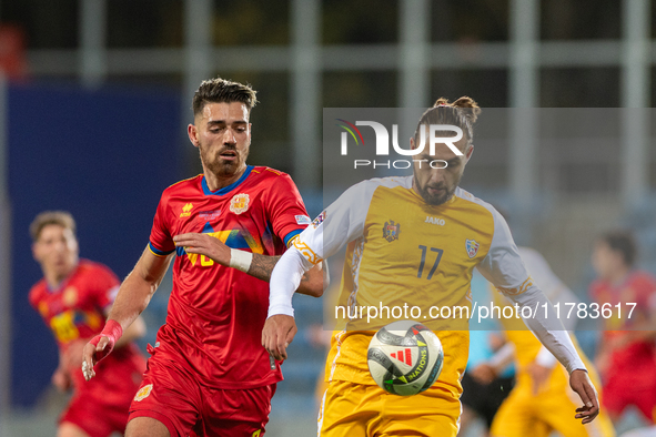 Christian Gonzalez of Andorra and Victor Mudrac of Moldova compete for the ball during the UEFA Nations League 2024 - League phase - Matchda...